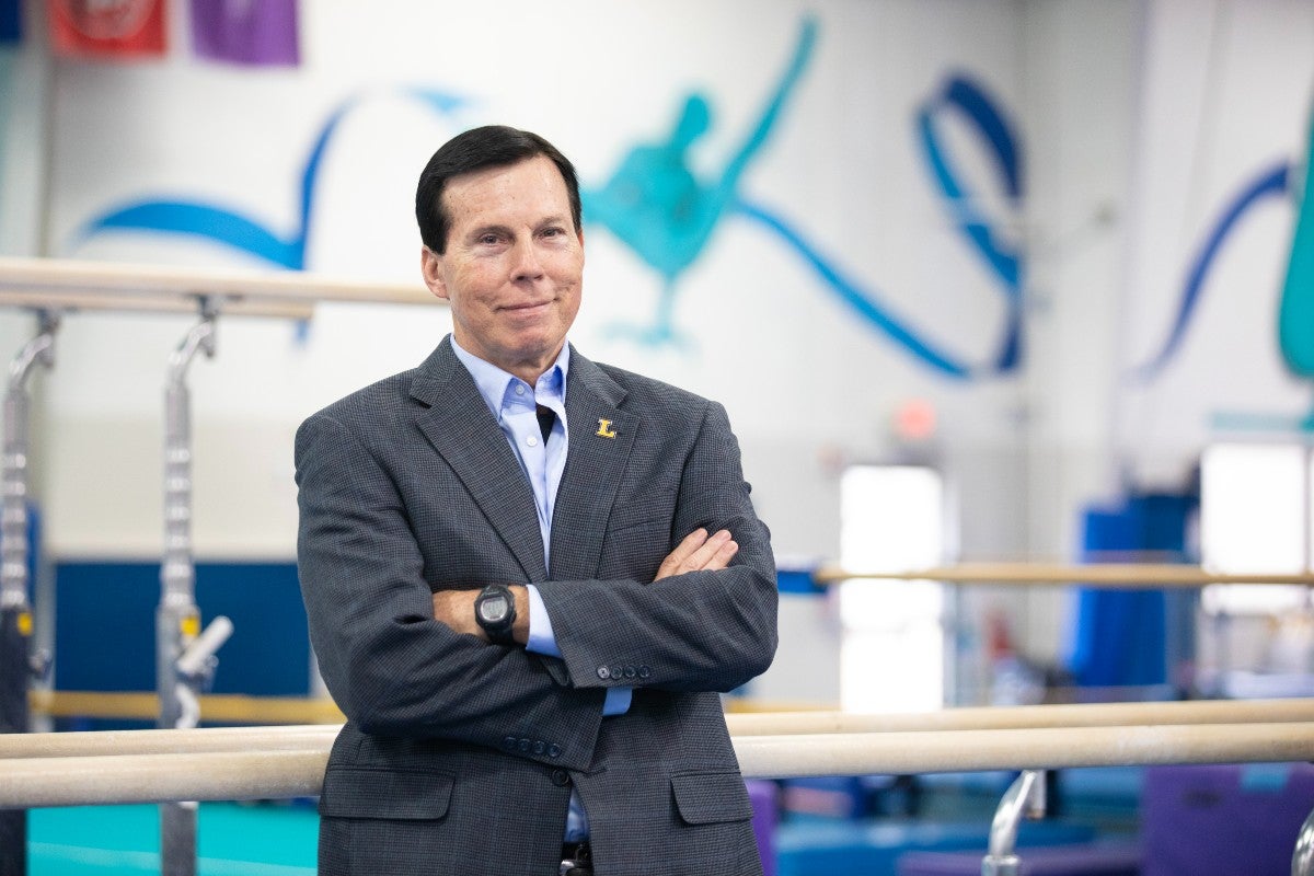 portrait of Drew Davis in a gymnastics gym 