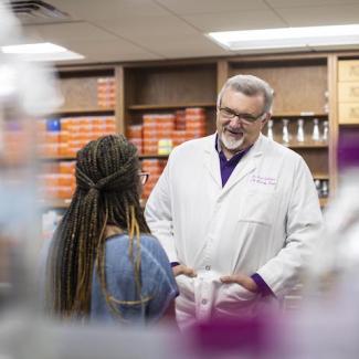 Dr. Kent Gallaher mentoring a student.