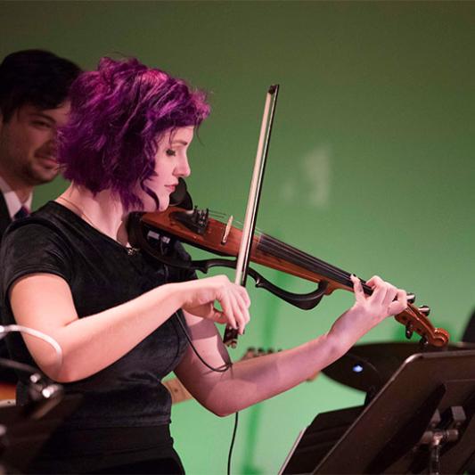 A student performs in a jazz concert.