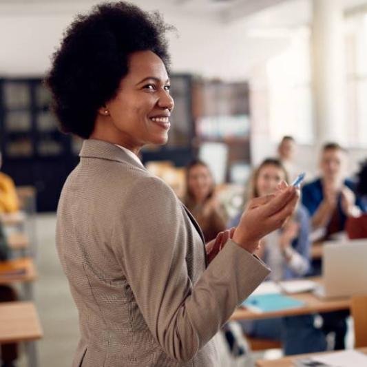 teacher with a class of students