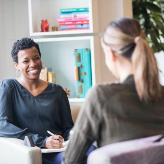 Female counselor in session with student