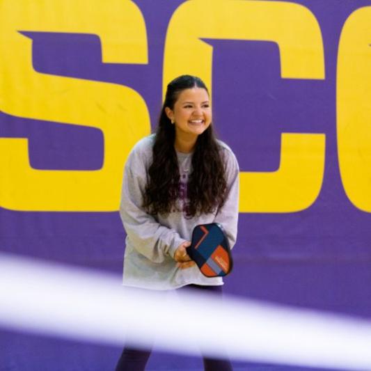 Student playing Pickleball