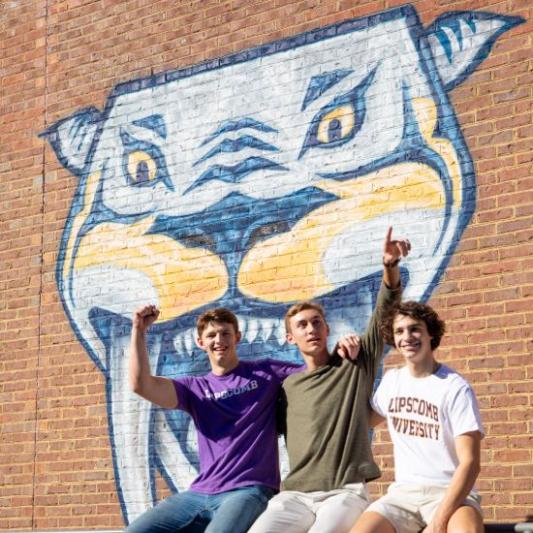 Students in front of Nashville Predators Mural