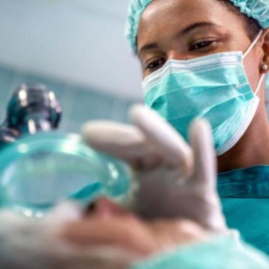 doctor putting on mask
