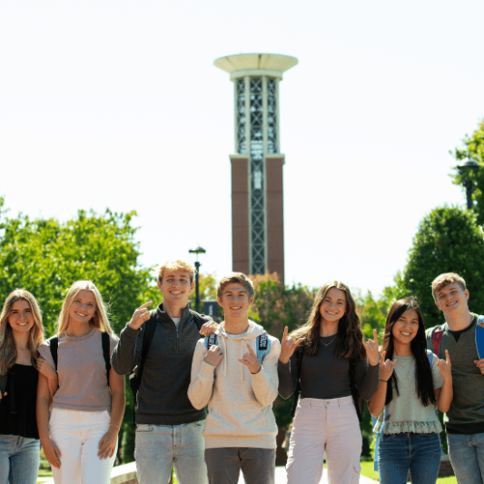 Students in front of Allen Bell Tower