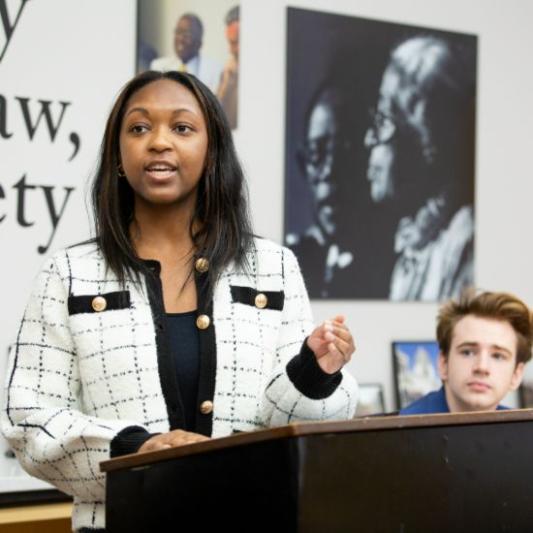 student speaking at the podium