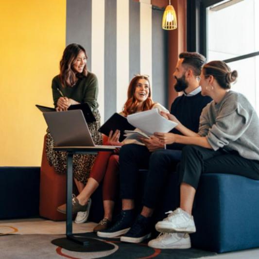 Young professionals working together in a tech startup office