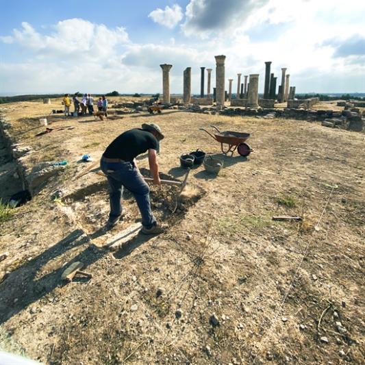 archaeologist digging in the ruins of Abila