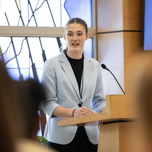 Student speaking at the Student Scholars Symposium
