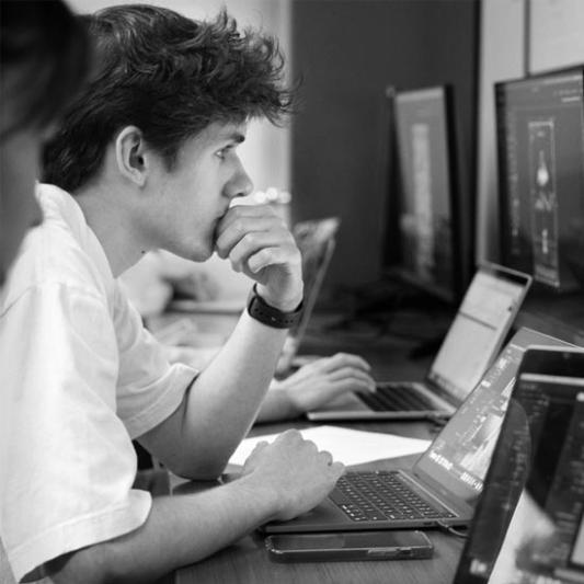 graphic design student working in class
