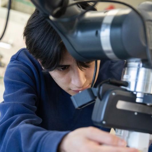 Martinez working on the robot arm