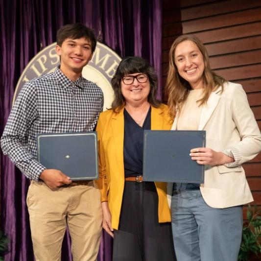 Kai Lam and Ellier Griner with the provost at the Student Scholars Symposium