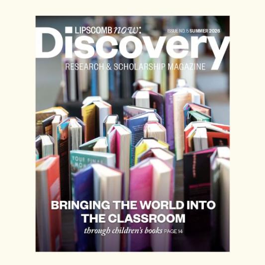 of the magazine cover with a close-up shot of children's books standing up on a table