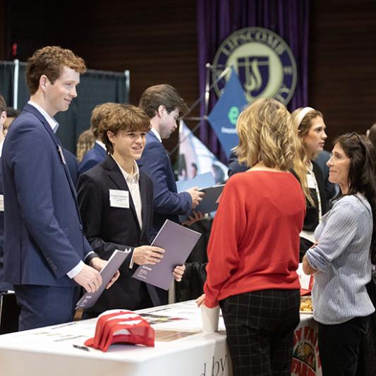 Students at career fair. 
