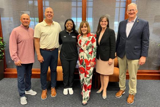 From left to right: Lennie Acuff, men's head basketball coach; Brandon Rosenthal, head volleyball coach; Lauren Sumski, women's head basketball coach; Sue Nokes; Lipscomb President Candice McQueen and Director of AthleticsPhilip Hutcheson.