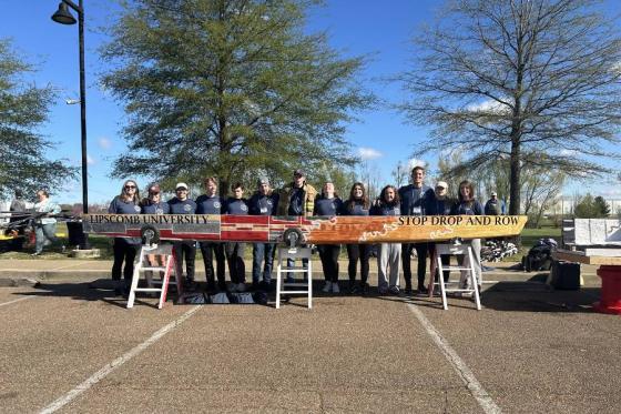 Concrete Canoe Team with the canoe