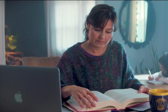 Mom taking online class.