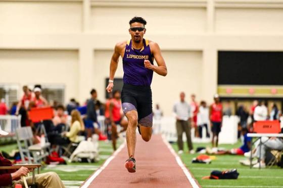 Martin running for the long jump in competition. 