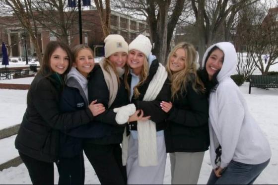 Groups of students on the Lipscomb campus in the snow