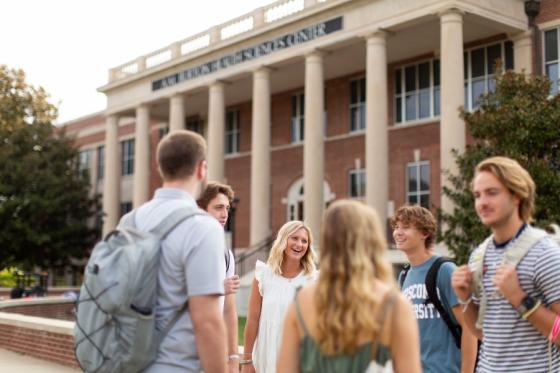 Students talking in Bison Square