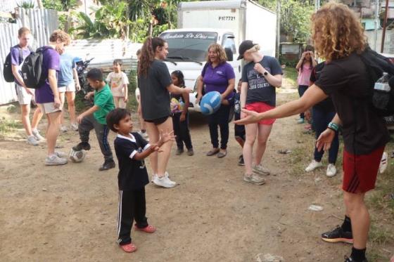 William Bryan on the mission field with children. 