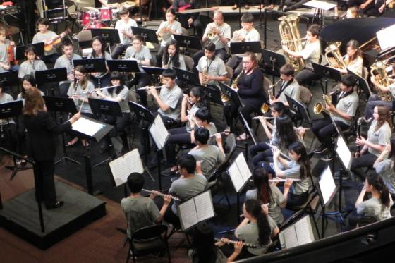 Matthews conducting the 2017 concert band at the ASIAC music festival