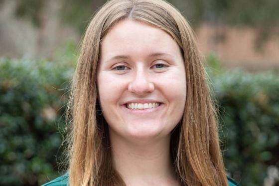 Headshot of Claire Edmondson standing outside