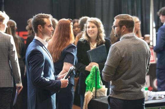 Students meeting with prospective employers at a recent career fair on campus. 