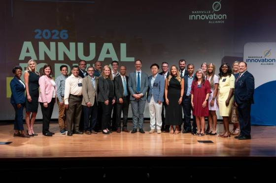 Group of individuals on stage with the Nashville Mayor. 