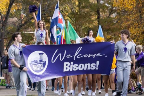The "Welcome Bisons" banner from the student parade at Bisons Weekend
